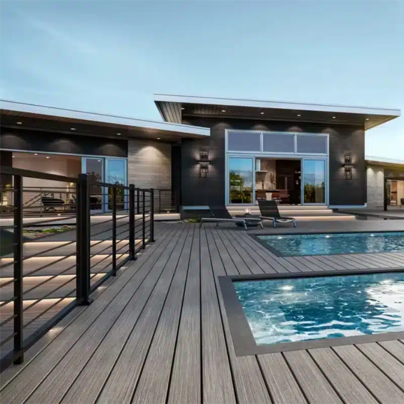 backyard-residential-deck-with-pool-chairs-sitting-area-on-the-luxury-house-with-black-metal-railing-featuring-amazing-sky-view-in-south-east-pa